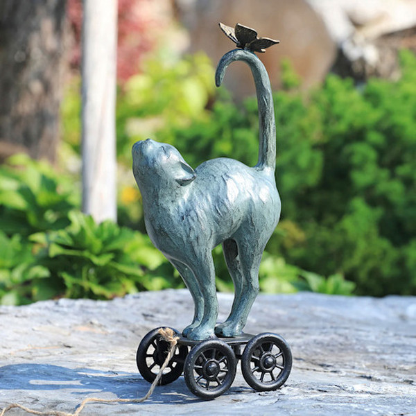 Cat on Pull Along Cart with Butterfly Statue